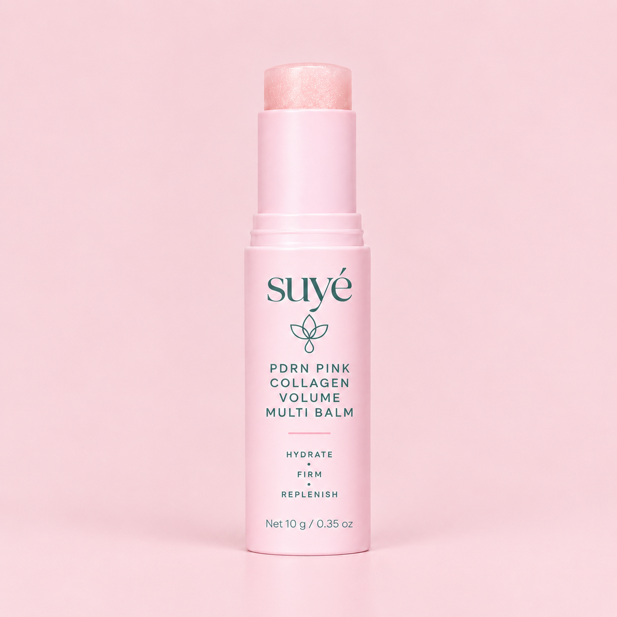 Suye Skin Collagen Plumping Lip Balm in a pink twist-up stick on a pink background